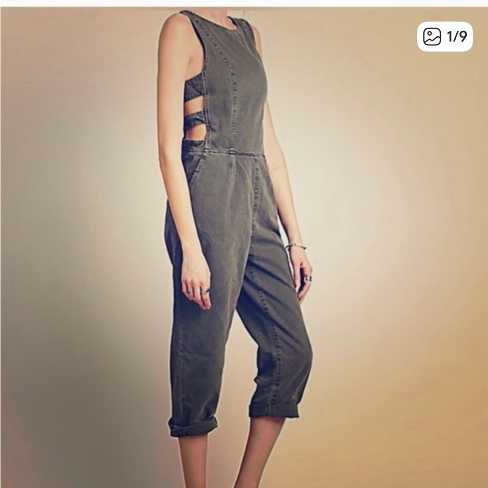 Free People dark army green/charcoal mix Jumpsuit with Side Cutouts.